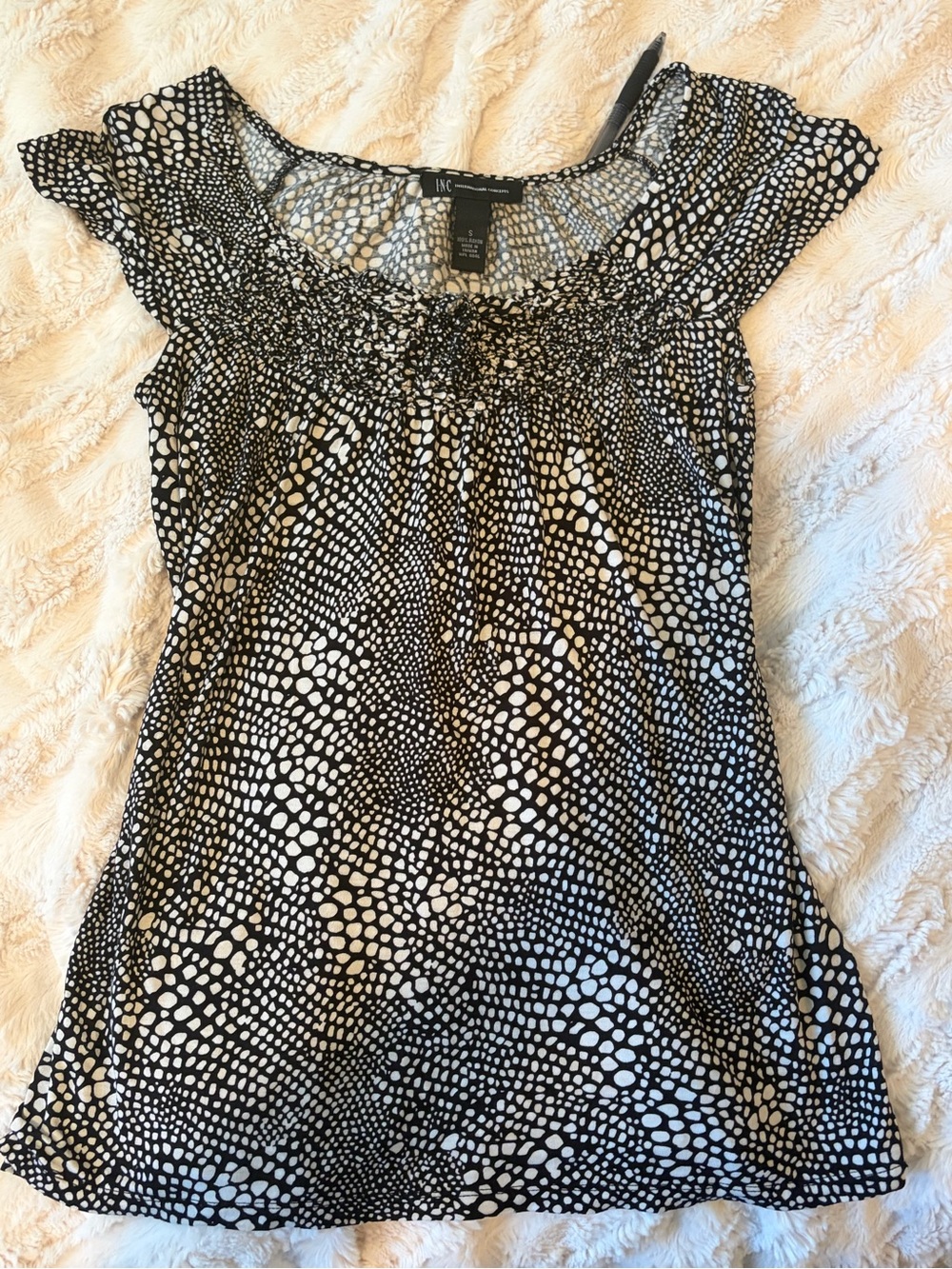 snake-print, black and white off shoulder top with smocked neck